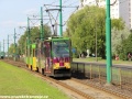 Souprava vozů Konstal 105Na ev.č.256+255 mezi zastávkami Osiedle Piastowskie a Osiedle Rzeczypospolitej. | 2.7.2012