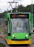 Siemens Combino ev.č.504 projíždí středem kruhového objezdu Rondo Śródka. | 13.7.2015