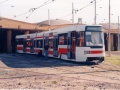 Prototypový vůz RT6N1 ev.č.0028 v červeno-bílém provedení nátěru na kolejové harfě vozovny Hloubětín. | 28.5.1996