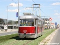 Vůz T3R.PLF ev.č.8252 vypravený na linku 25 míří zatravněným úsekem tramvajové tratě u Sazka arény ke stejnojmenné zastávce. | 14.7.2007
