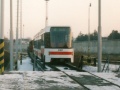 Vůz RT6N1 ev.č.9101 během přepravy z pražské kolejové sítě k výrobci. | 22.12.1999