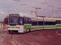 Vůz RT6N1 ev.č.9102 vypravený na linku 11 manipuluje na vnější koleji smyčky Ústřední dílny DP. | 14.4.1998