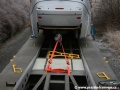 Ukotvení vozu Škoda 14T ev.č.9115 na plošinové vozy pomocí popruhů, zabraňujících posunu vozu během přepravy | 28.12.2006