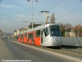Vůz Škoda 14T ev.č.9147 vypravený na linku 26 projíždí tramvajovou tratí po Letenské pláni | 21.11.2009