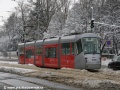 Od vokovické vozovny míří k Divoké Šárce vůz Škoda 14T ev.č.9150 vypravený na linku 20 během sněhové kalamity. | 11.1.2010